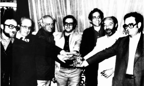 Nit electoral del 15-j 1977, a l’Hotel Manila. D’esquerra a dreta: Juli Busquets, Paco Ramos, Alexandre Cirici, Josep Maria Triginer, Raimon Obiols, Eduardo Martín Toval i Joan Reventós